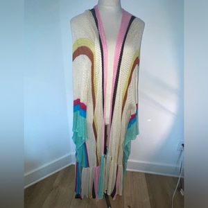knit maxi kimono, featuring a bright striped pattern and ruffle